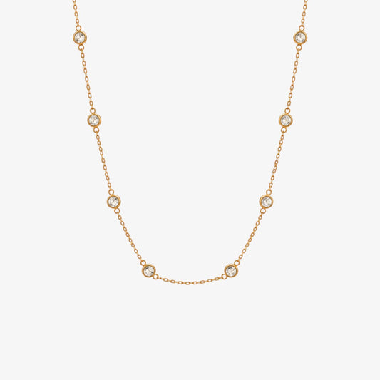 Gold Crystal Station Necklace with bezel-set round crystals on a delicate stainless steel chain | LAFENY